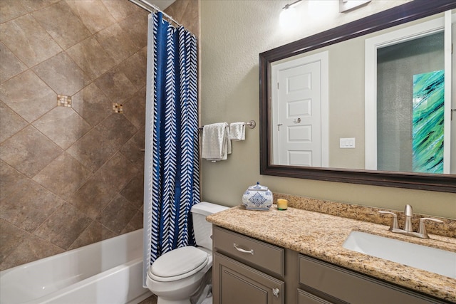 full bathroom with vanity, shower / tub combo with curtain, and toilet