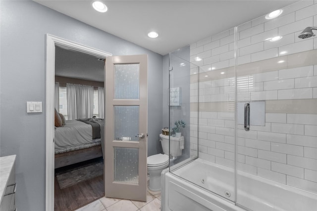 bathroom with tile patterned flooring and toilet