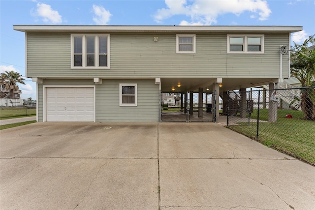 view of front of home with a carport and a garage