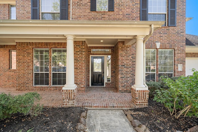 property entrance featuring a porch