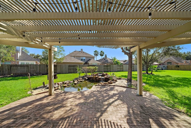 view of patio featuring a pergola