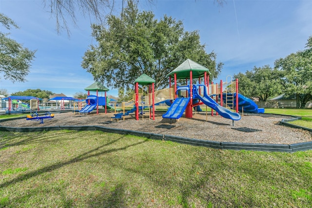 view of jungle gym featuring a yard