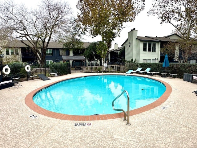 view of pool with a patio