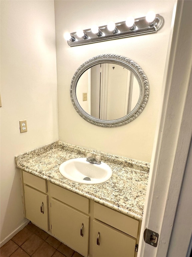 bathroom with tile patterned flooring and vanity