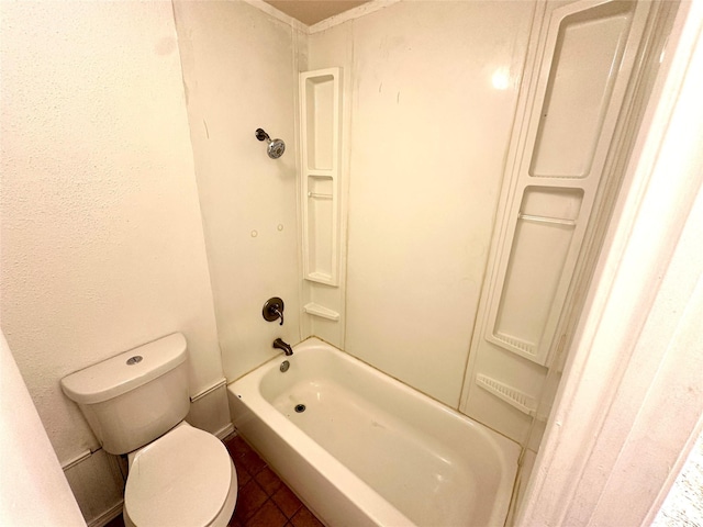 bathroom featuring toilet and shower / bathing tub combination