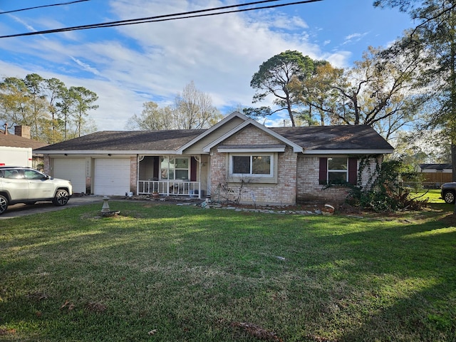 ranch-style home featuring a garage, a front lawn, and a porch