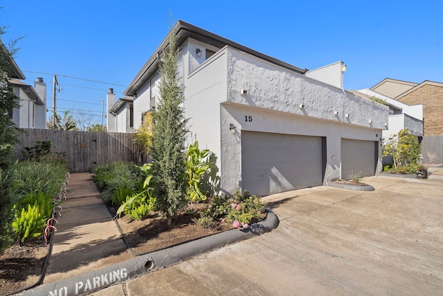 view of property exterior featuring a garage