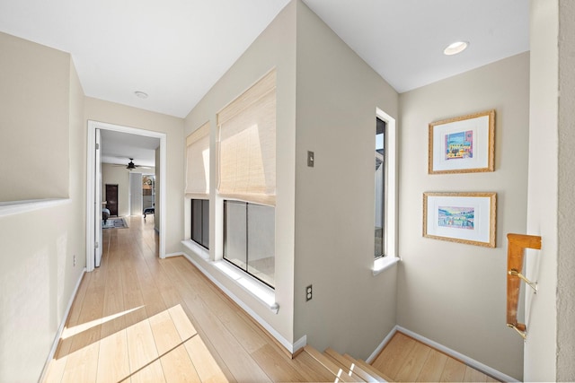 hallway with light wood-type flooring