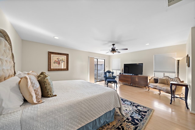 bedroom featuring ceiling fan and light wood-type flooring