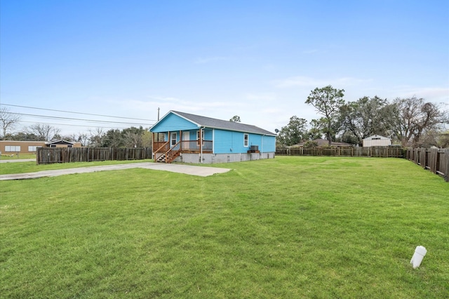 view of yard with covered porch