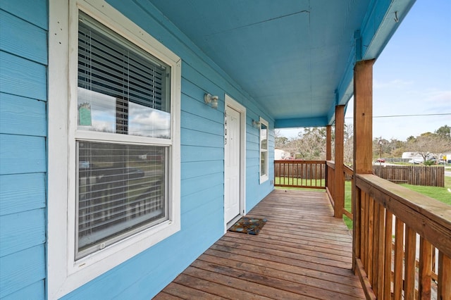 wooden terrace featuring a porch