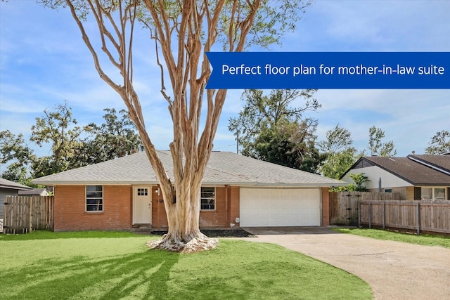 ranch-style home with a garage and a front lawn