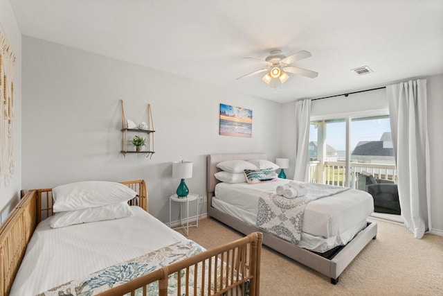 bedroom with ceiling fan, access to exterior, and light colored carpet