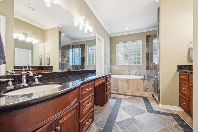 bathroom featuring crown molding, vanity, and shower with separate bathtub