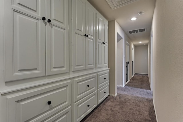 hallway featuring carpet flooring