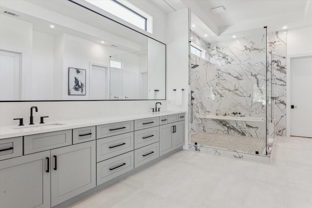 bathroom with vanity and walk in shower