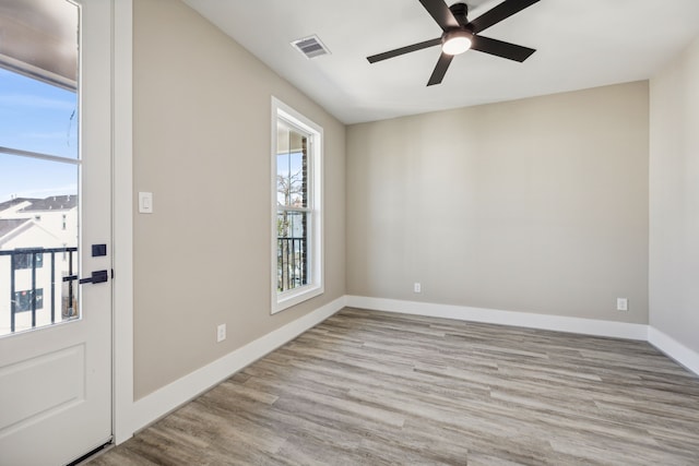 foyer featuring light wood-type flooring and ceiling fan