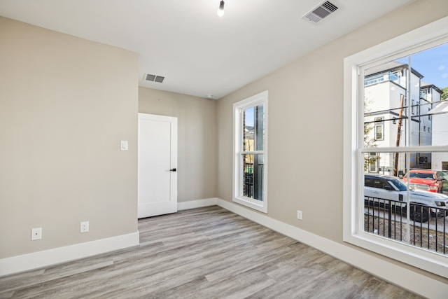 empty room featuring light wood-type flooring