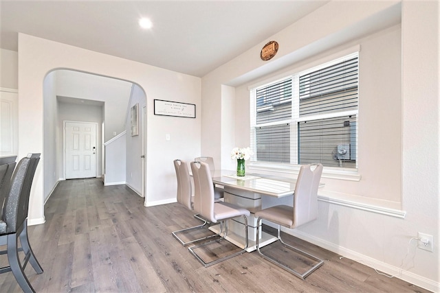 dining space with light wood-type flooring