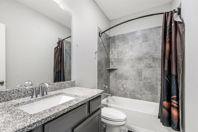 full bathroom featuring shower / bath combo, toilet, and vanity