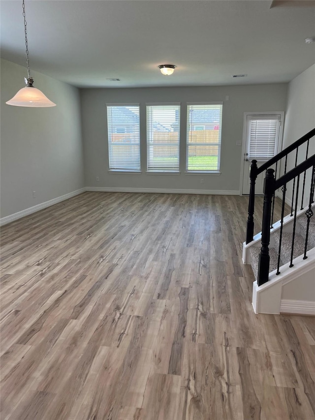 interior space featuring light hardwood / wood-style floors and a wealth of natural light