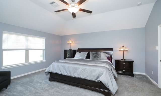 bedroom with ceiling fan, carpet, and lofted ceiling