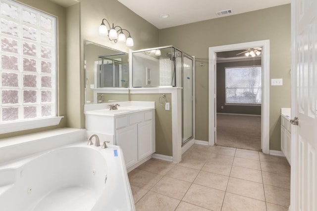 bathroom with tile patterned floors, ceiling fan, vanity, and independent shower and bath