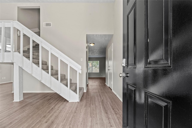 foyer featuring light hardwood / wood-style floors