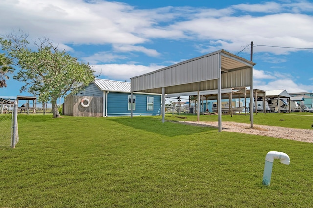 view of property's community featuring a yard