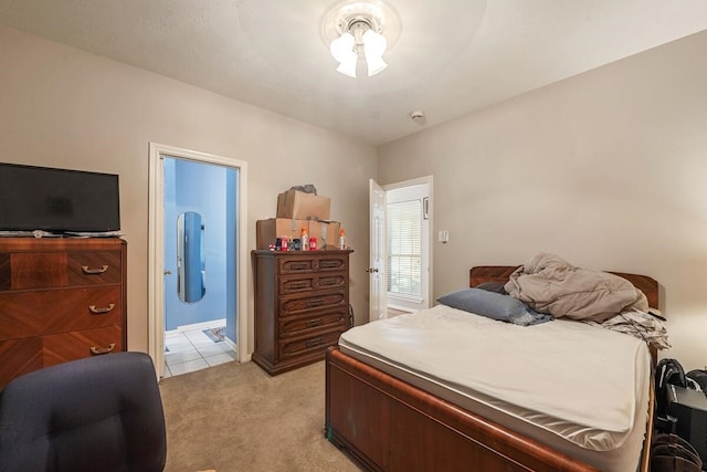 bedroom featuring light colored carpet