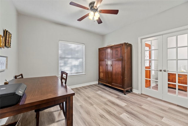 office featuring french doors, light hardwood / wood-style flooring, and ceiling fan