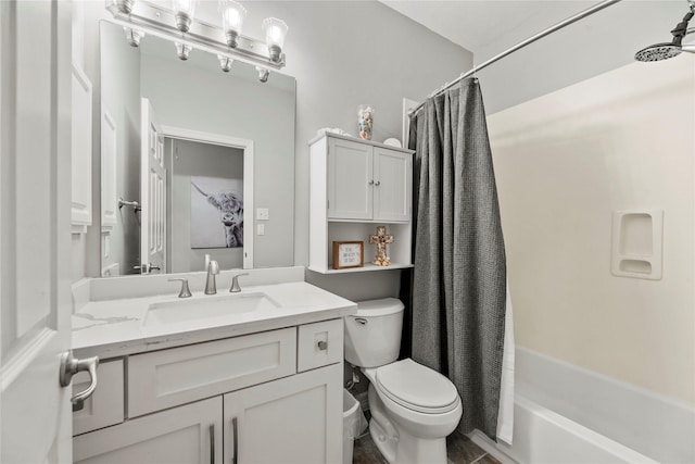 full bathroom featuring toilet, vanity, and shower / tub combo with curtain