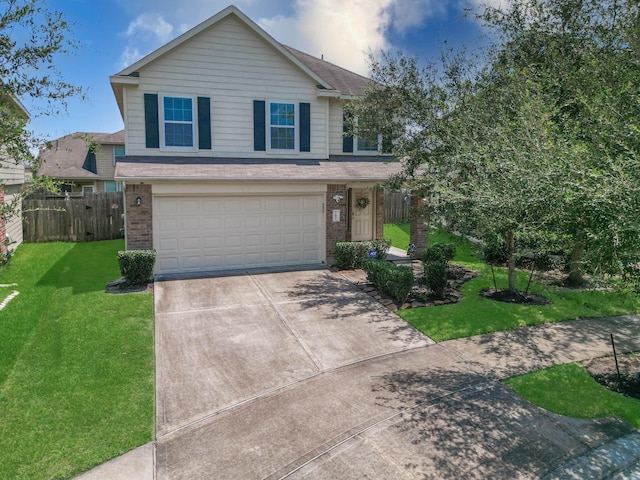 view of front facade with a garage and a front yard