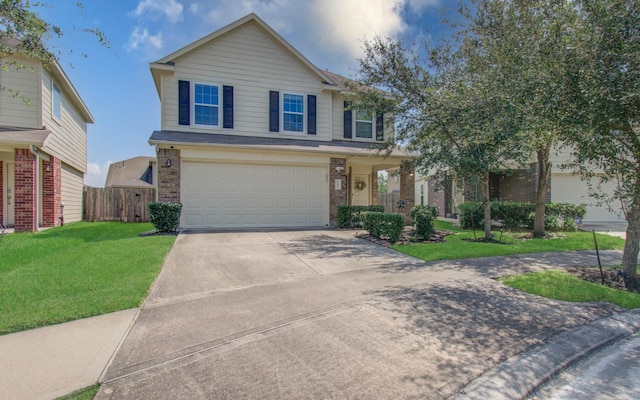 view of front facade featuring a front yard and a garage