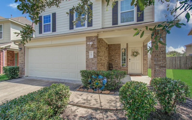 view of front of property with a garage