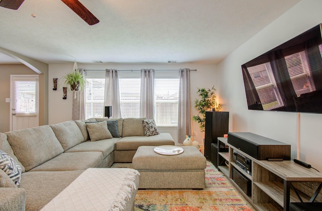 living room with ceiling fan