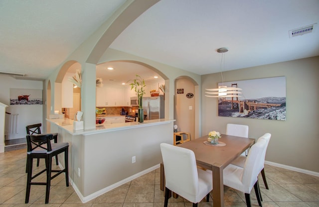 view of tiled dining room