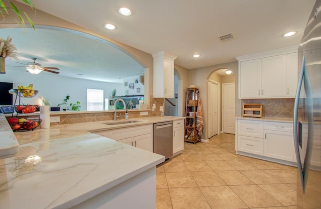 kitchen with white cabinetry, sink, ceiling fan, and appliances with stainless steel finishes