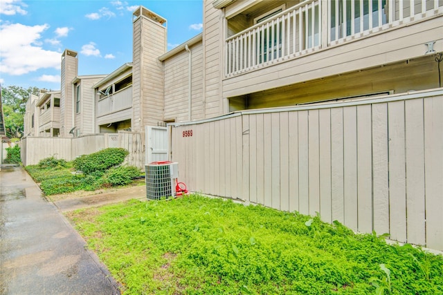 view of property exterior featuring cooling unit