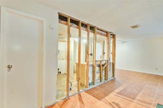 corridor featuring tile patterned floors