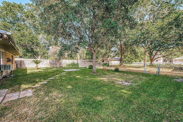 view of yard featuring a fenced backyard