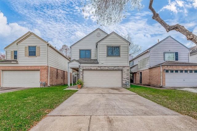 view of property with a front yard and a garage