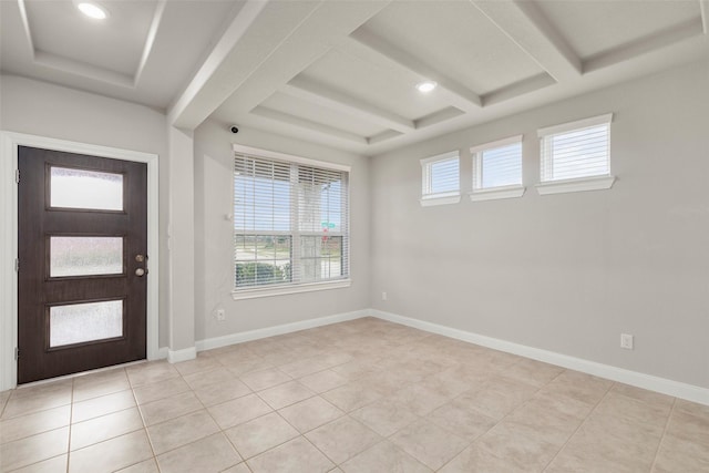 tiled entryway featuring a wealth of natural light and coffered ceiling