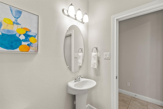 bathroom featuring tile patterned flooring