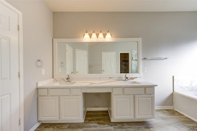 bathroom with vanity and a tub to relax in