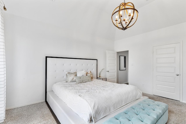 bedroom featuring carpet, high vaulted ceiling, and an inviting chandelier