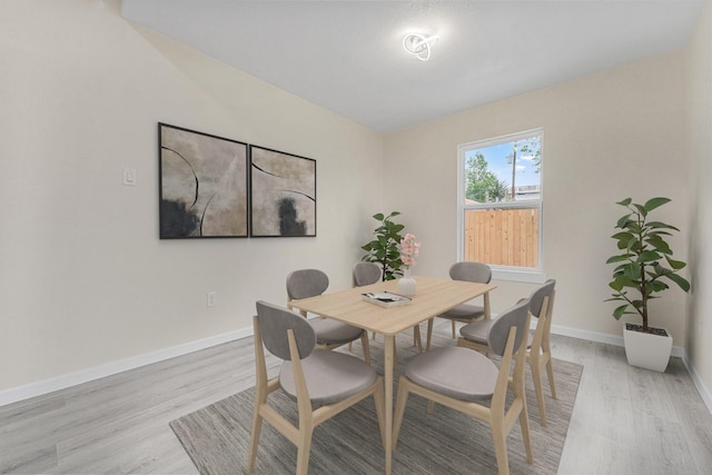 dining room with light hardwood / wood-style flooring