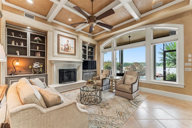 tiled living room with coffered ceiling, built in features, and beam ceiling