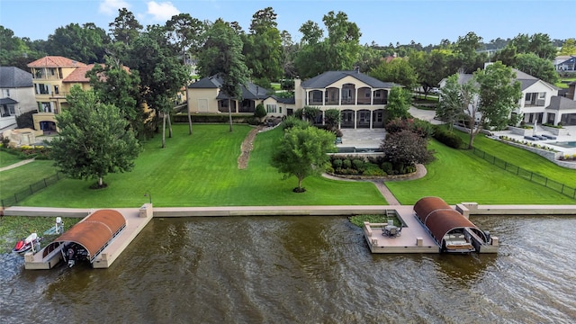 birds eye view of property featuring a water view