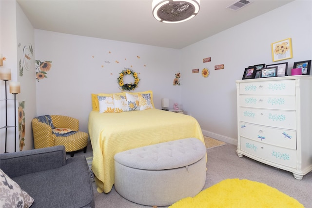 bedroom with light colored carpet